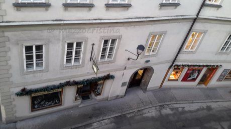 Salzburg 5 - looking down on a narrow Salzburg street still half asleep, and rejoicing in the feeling of history preserved for so many years